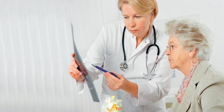 Doctor prescribes treatment for back pain